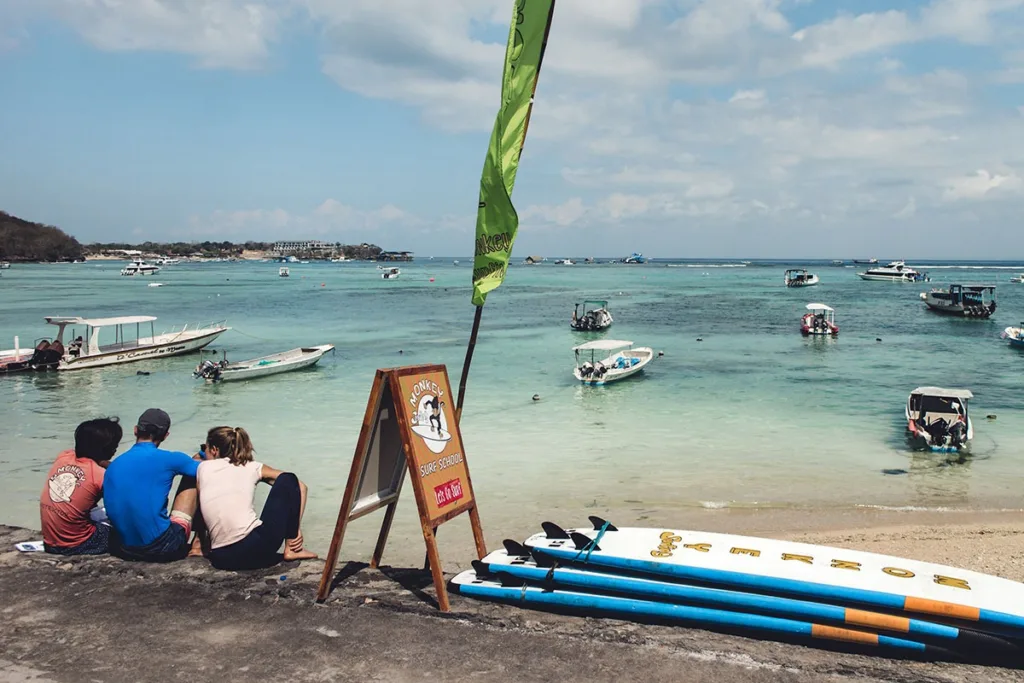 Surf retreat guests preparing for ocean time in Nusa Lembongan.